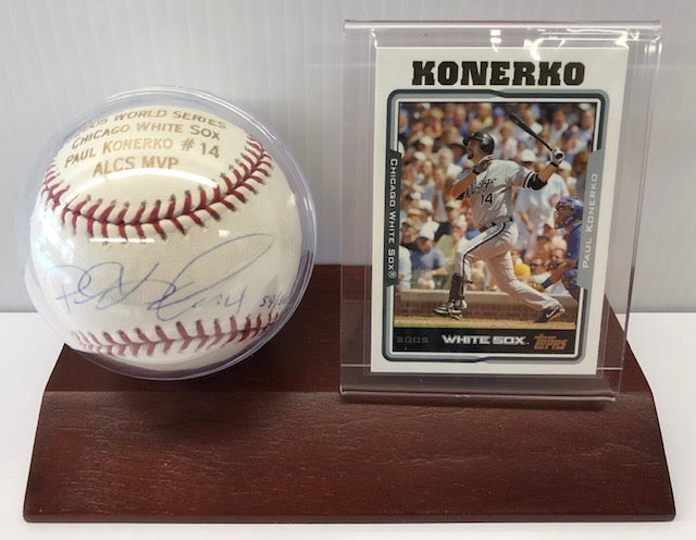 2005 Baseball Autographed by select team members, including Paul